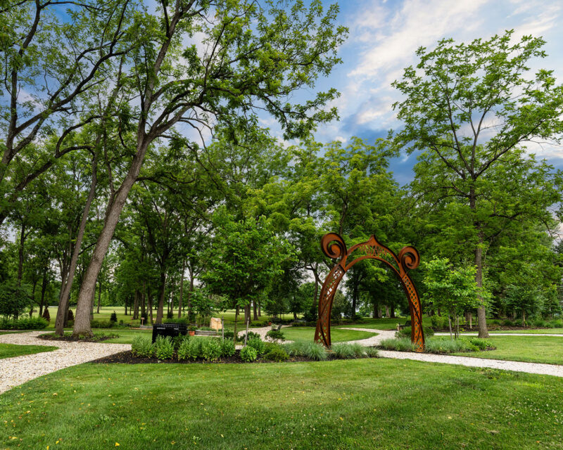 Scenic gravel walking path through park