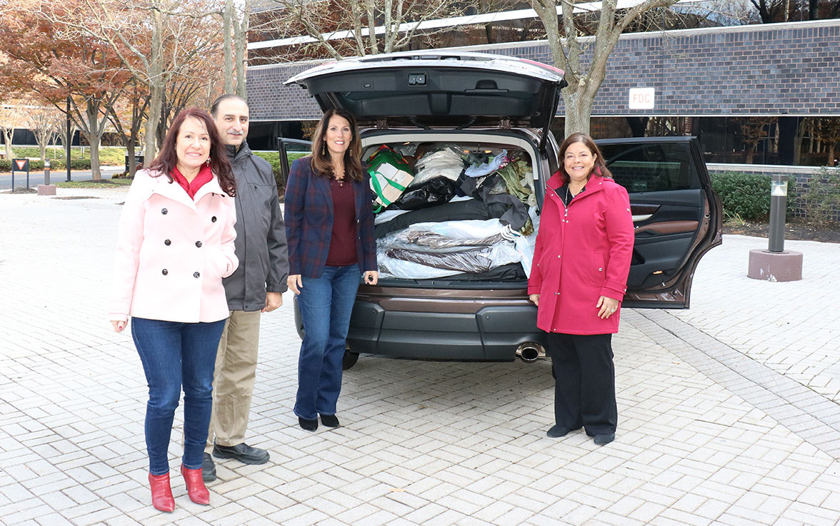 Clothing donations loaded in car for Dress for Success