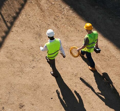 men walking on construction site