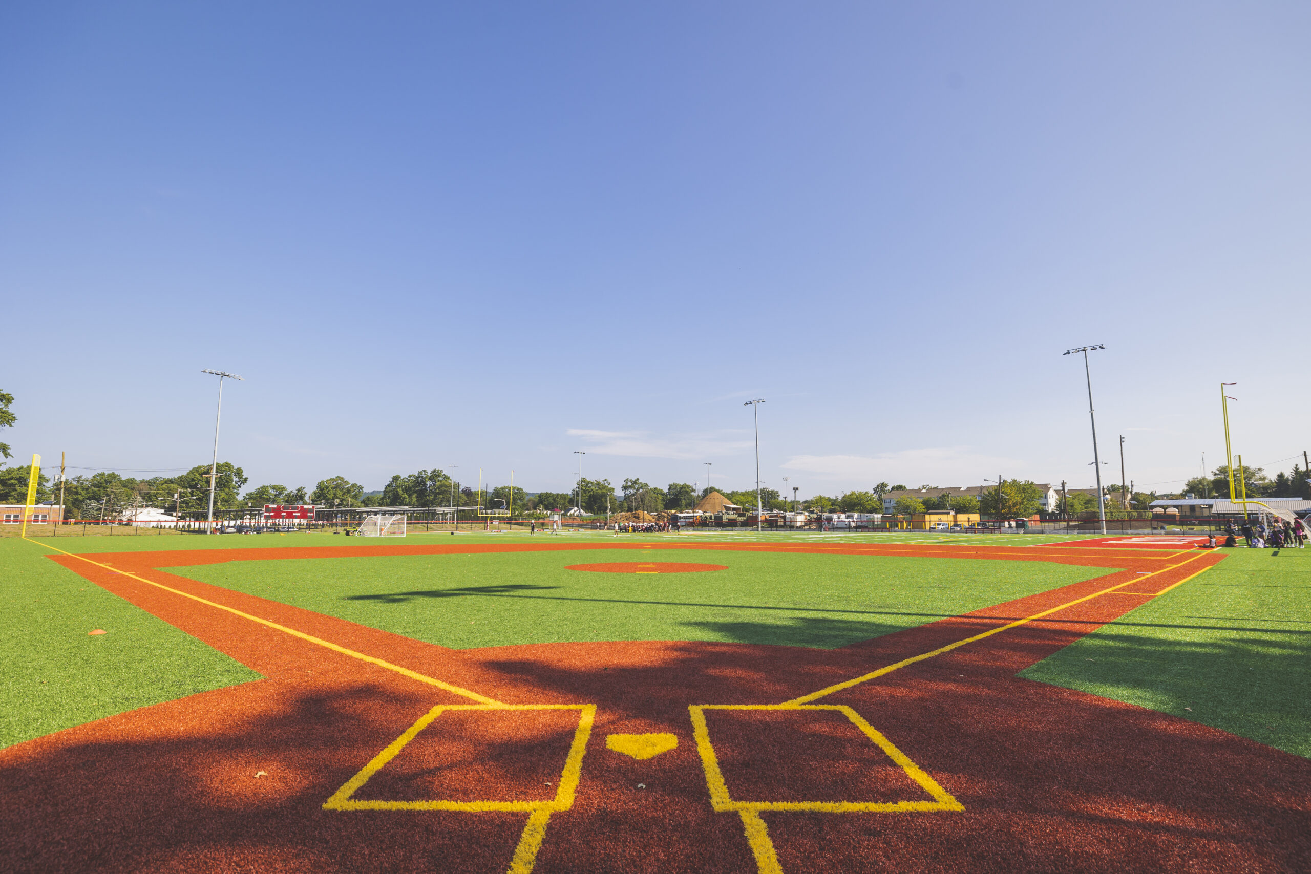 Rabkin Park featuring a well maintained baseball field on a bright sunny day.