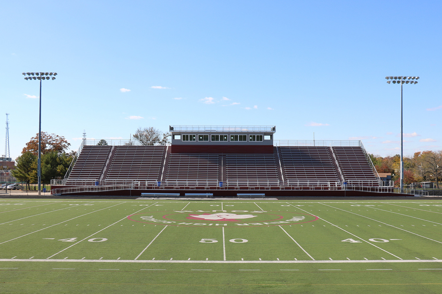 Toms River High School field with newly constructed restroom buildings, fences, and gates.