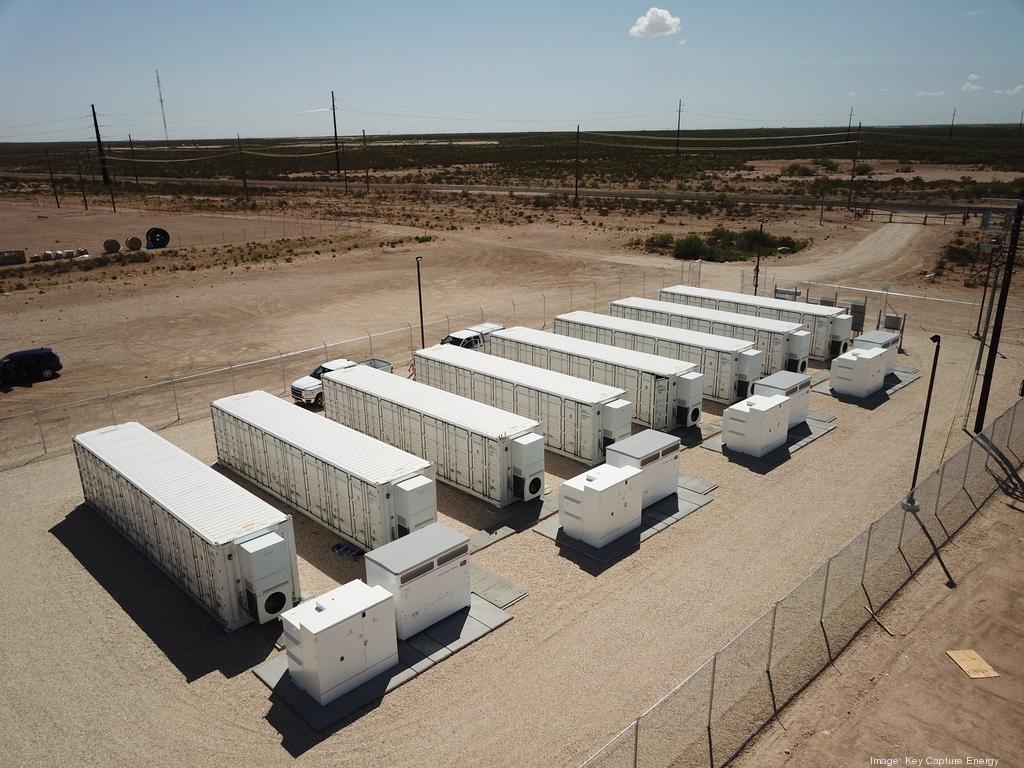 Row of battery energy storage systems (BESS) located in a arid environment.