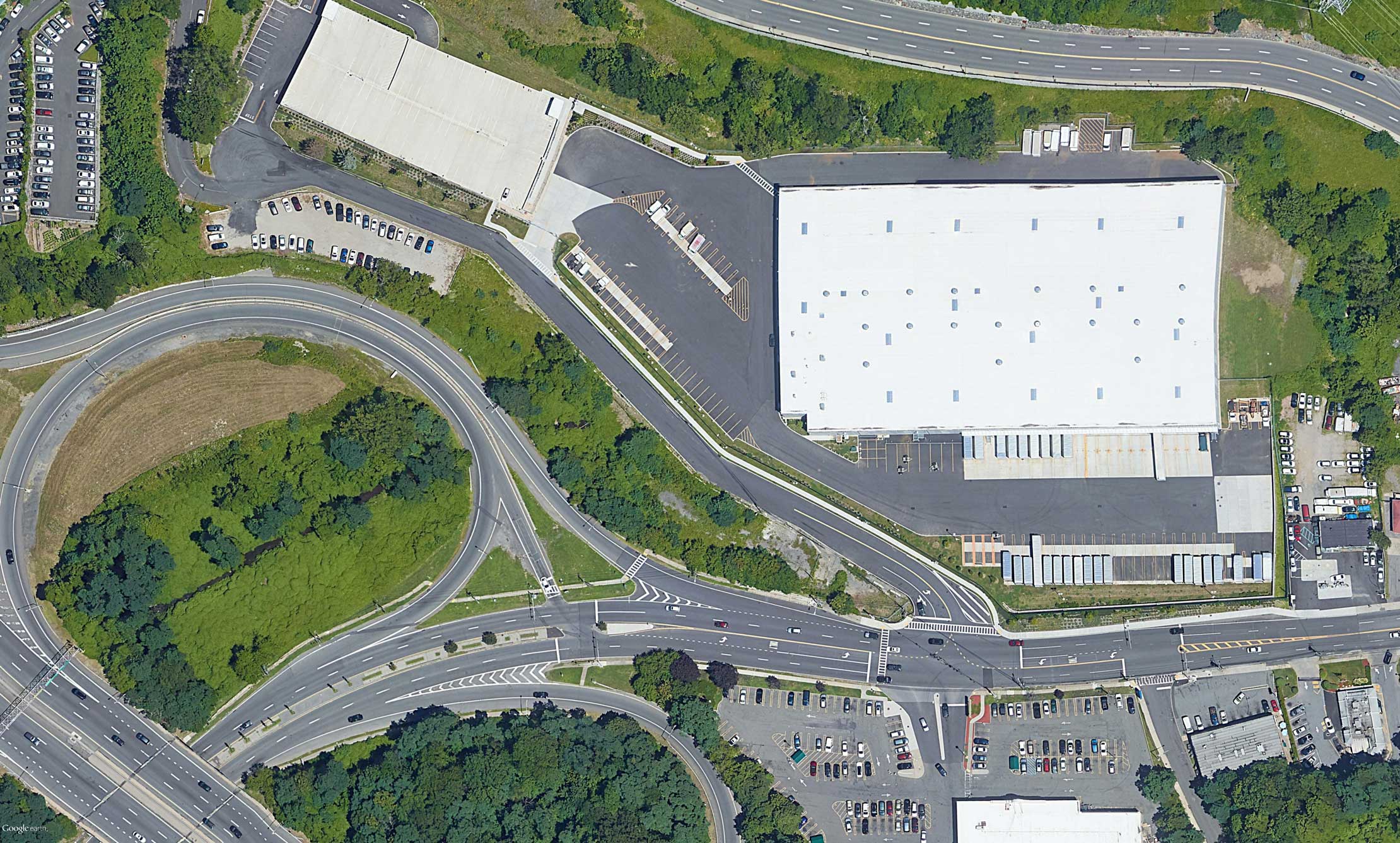 Winding roads and foliage alongside FedEx Ground Distribution Center.