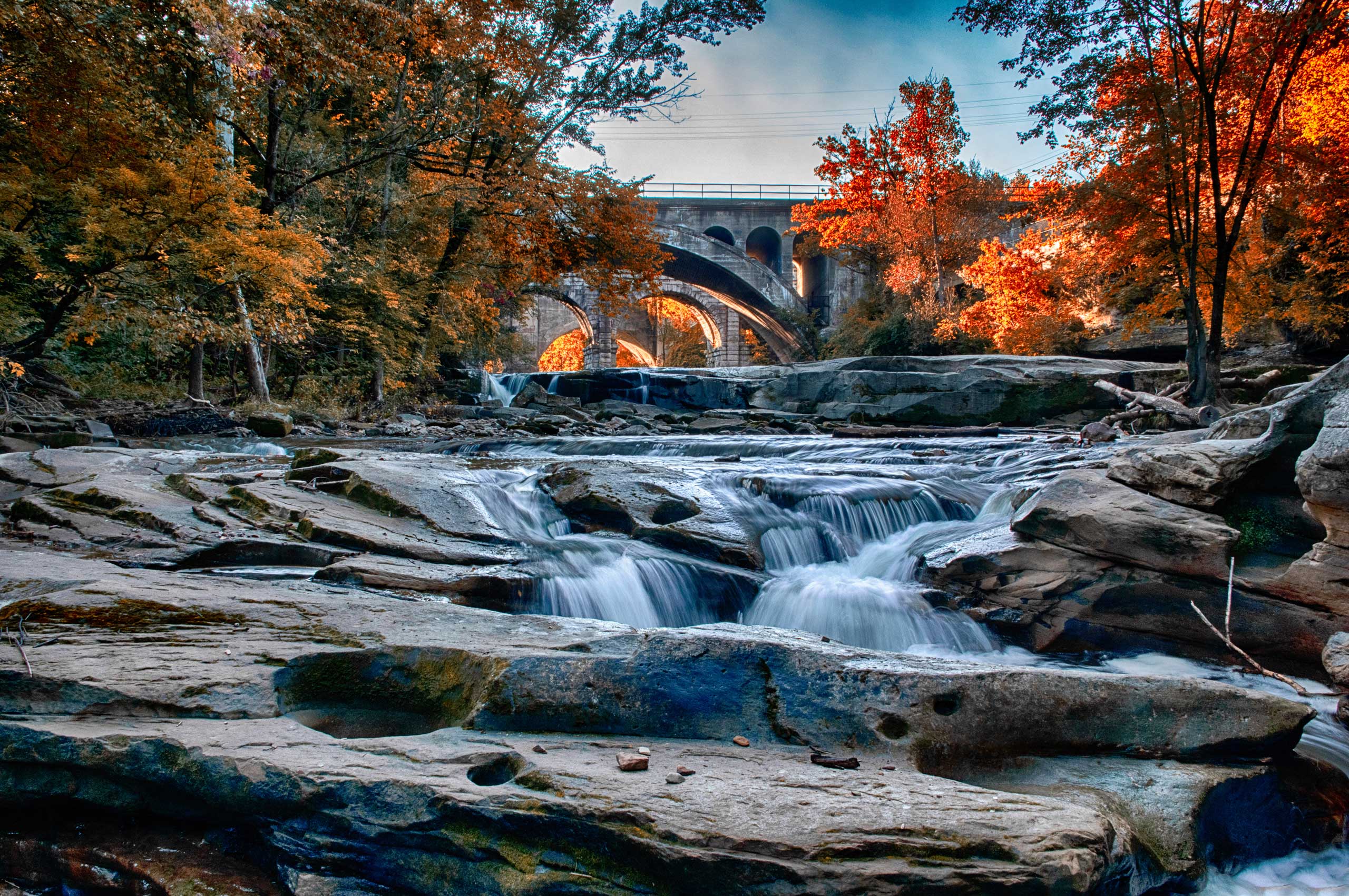Ohio stream under stone bridge