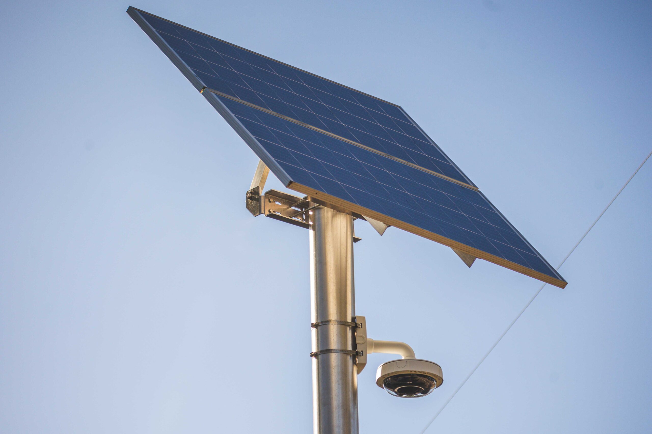 Stand-alone grid against bright blue sky background.