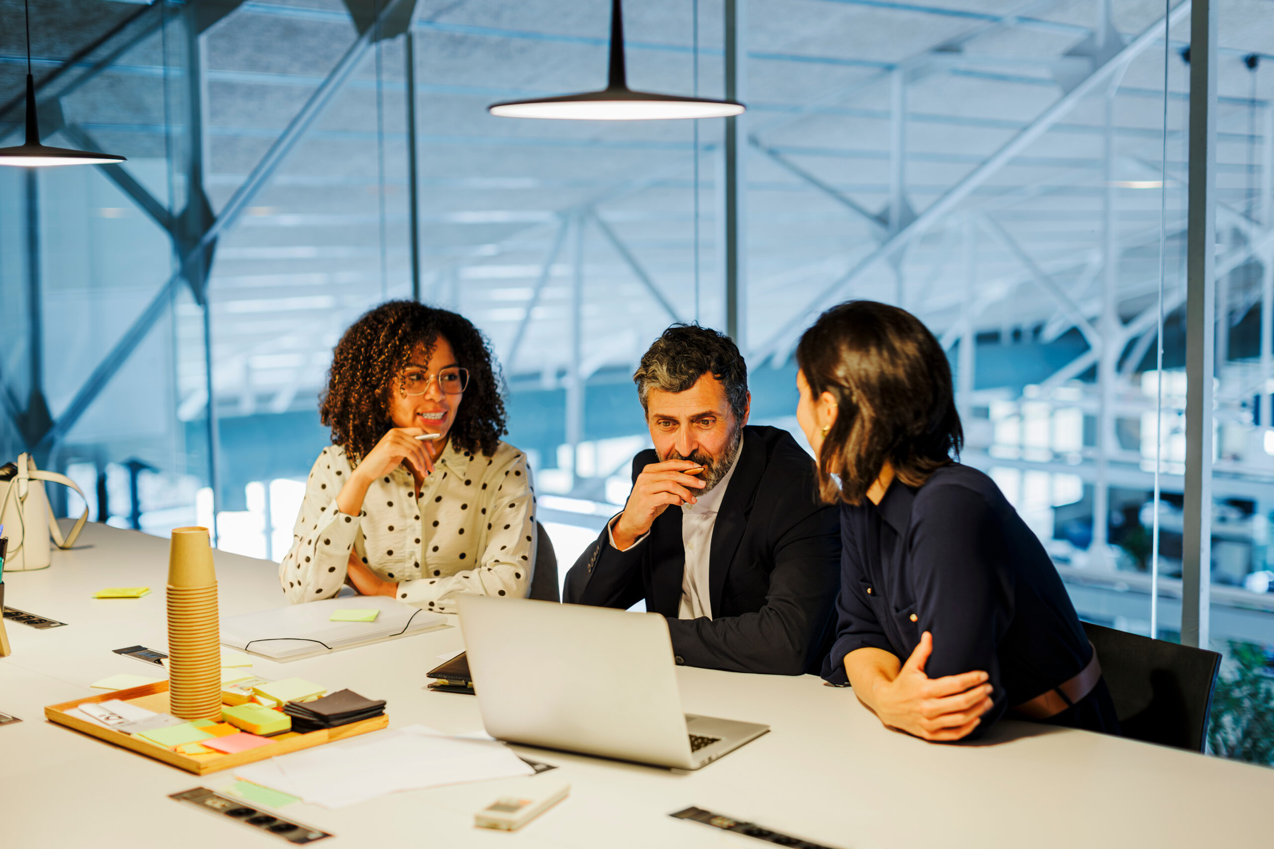 Small team of individuals collaborates 