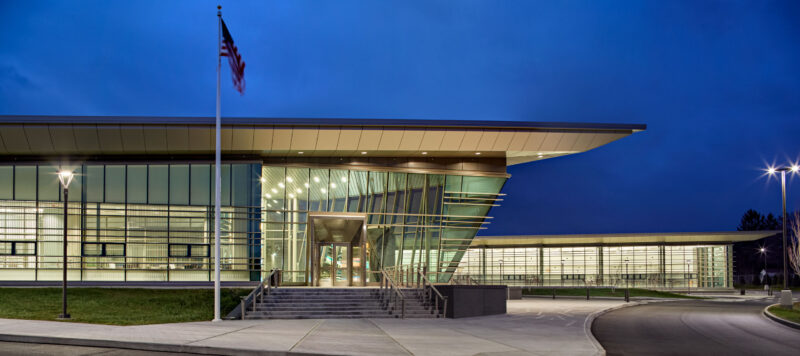 Exterior of Emmett O’Brien Vocational Technical High School at night