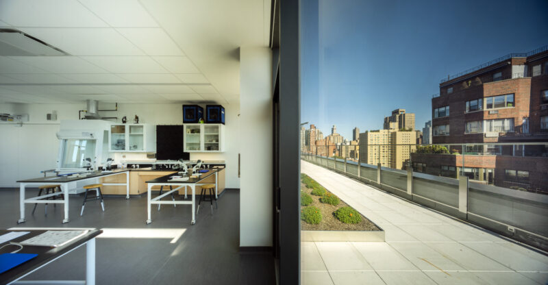 Interior of science classroom and the adjacent outdoor patio space