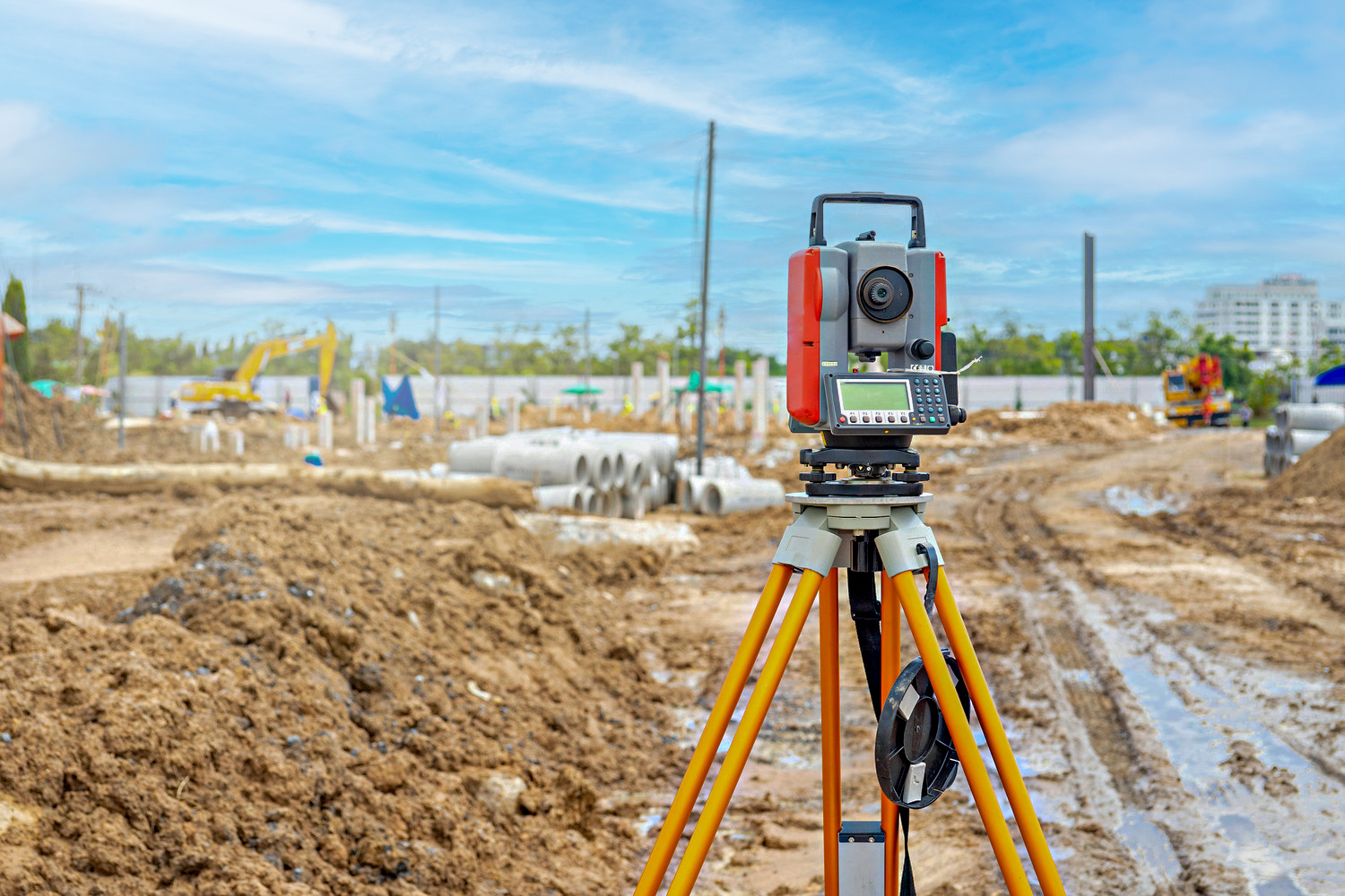 Surveyor equipment GPS system or theodolite outdoors at construction site.