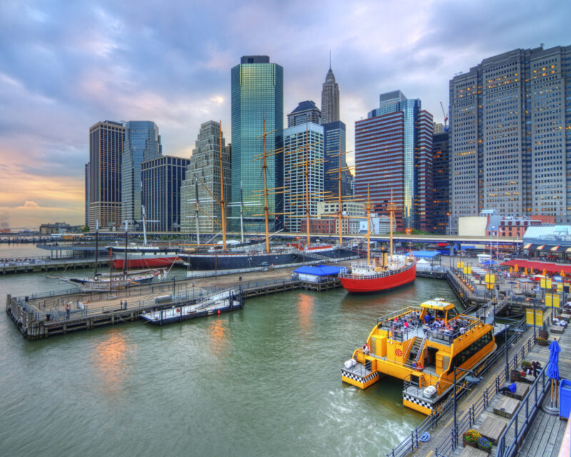 Various marine vessels docked at NYC's Pier 6